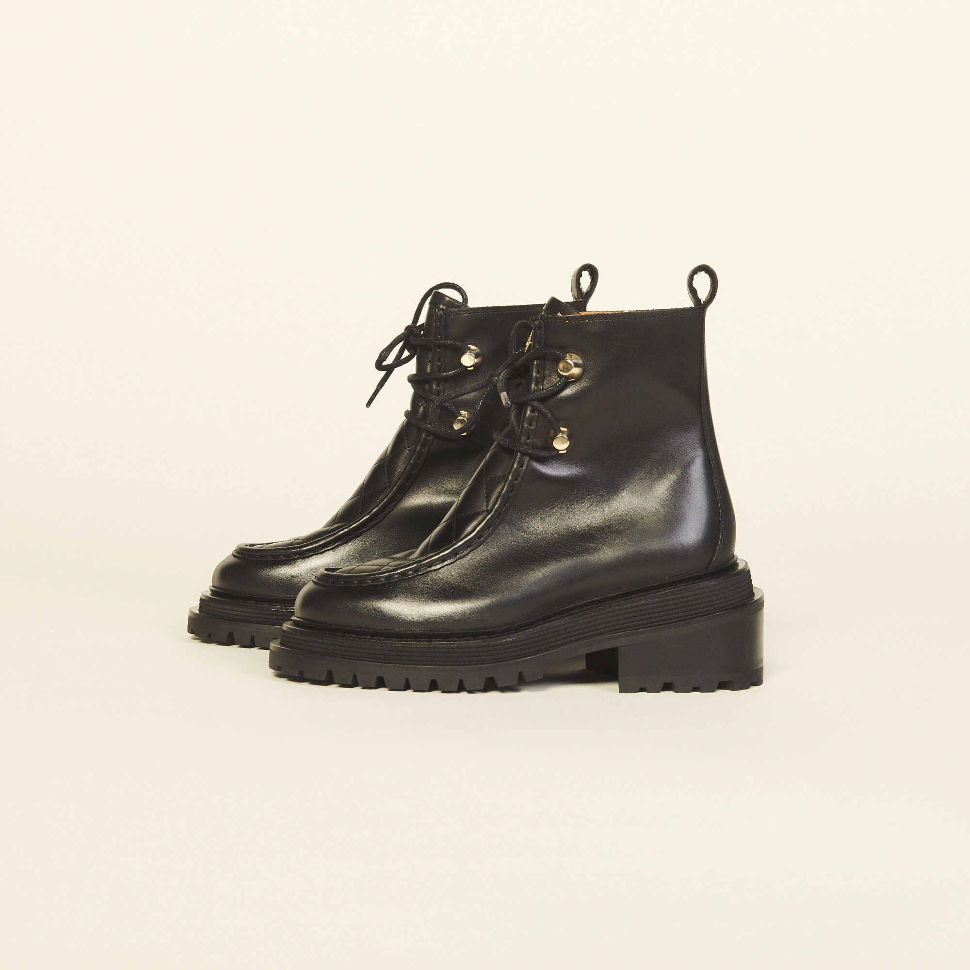 Quilted leather ankle 2025 boot with belt